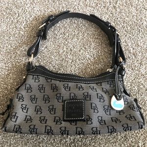 Dooney & Bourke Mini Slouch bag in black DB signature canvas w/leather handle.